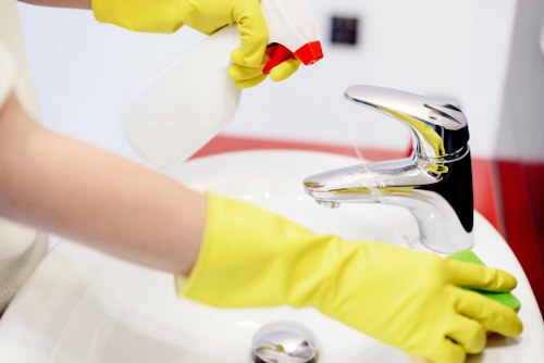 Technician carrying out a carpet cleaning risk assessment before work begins