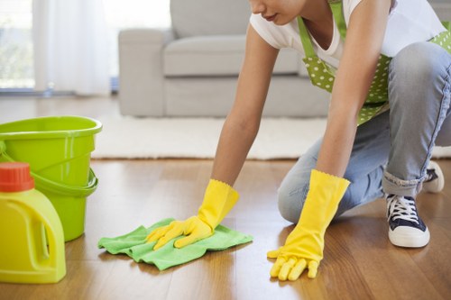 Cleaning dust and residue from a newly finished interior in SE13